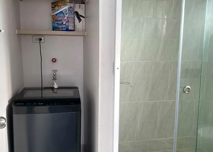 A Minimalist And Spacious 1br At Amani Grand Residences Mactan Near Mcia *