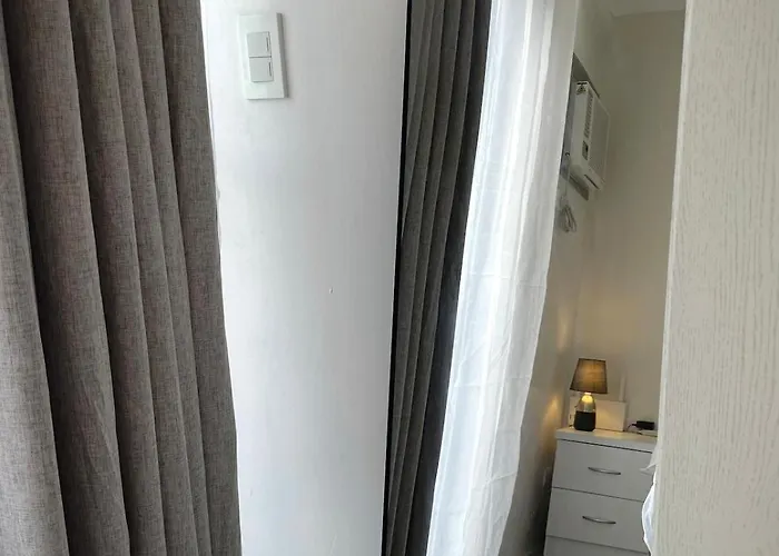 A Minimalist And Spacious 1br At Amani Grand Residences Mactan Near Mcia Lägenhet